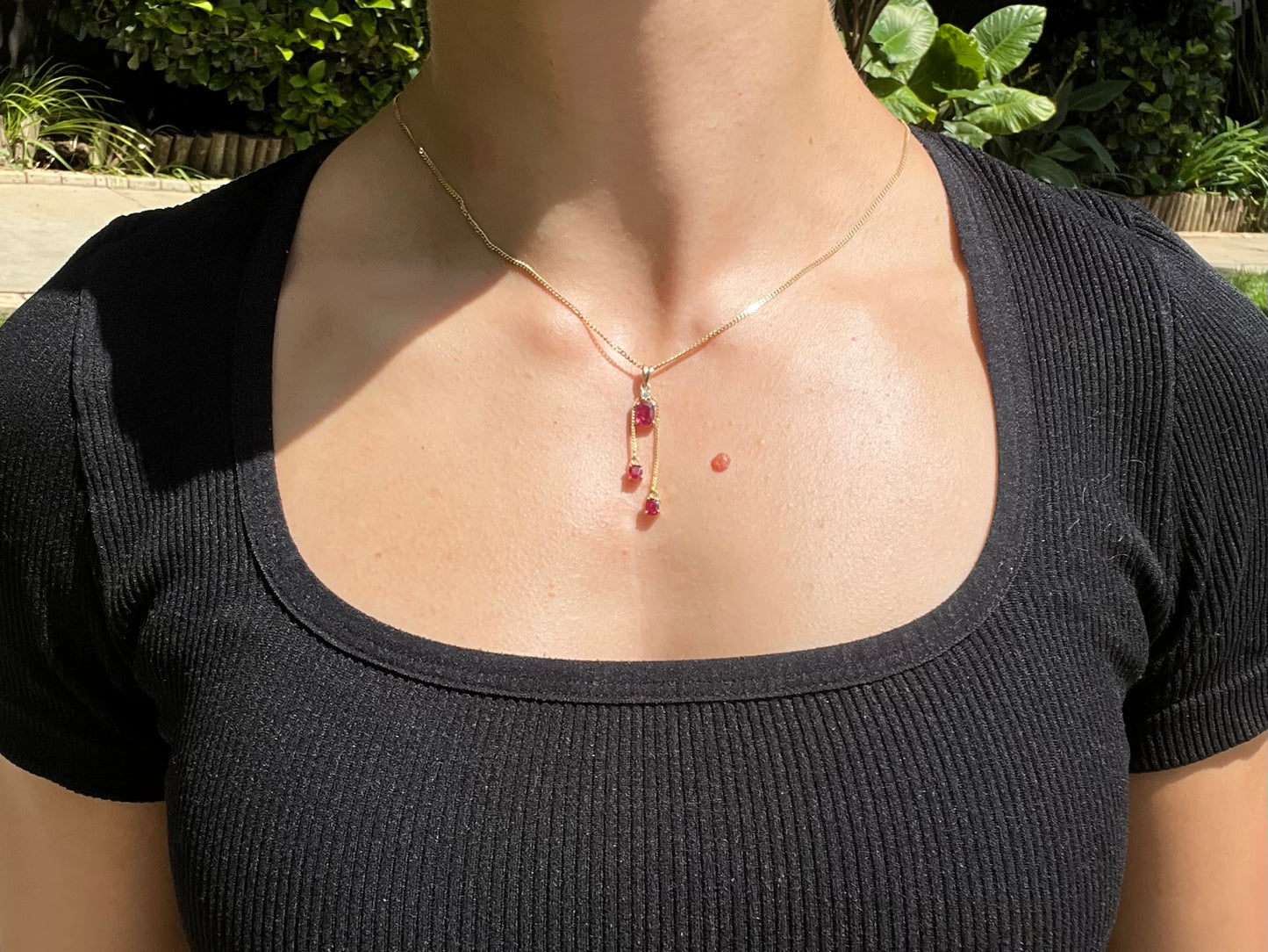 Mid-century, 14K gold ruby and diamond tassel pendant