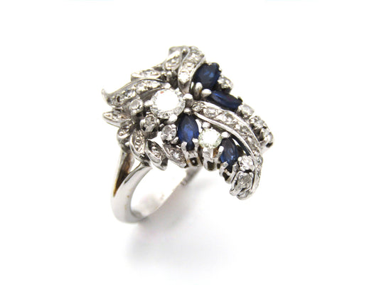 Edwardian, 18K gold French sapphire and diamond 'grapevine' ring