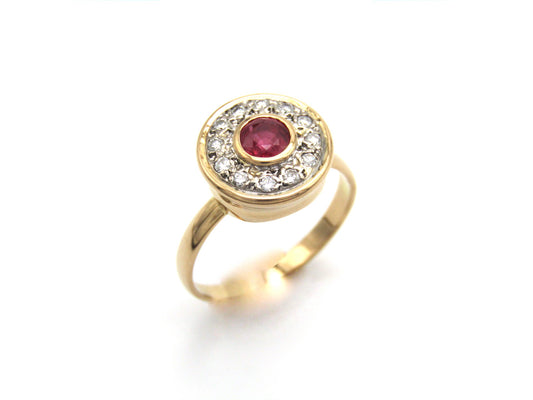 Vintage, 18K gold ruby and diamond halo ring
