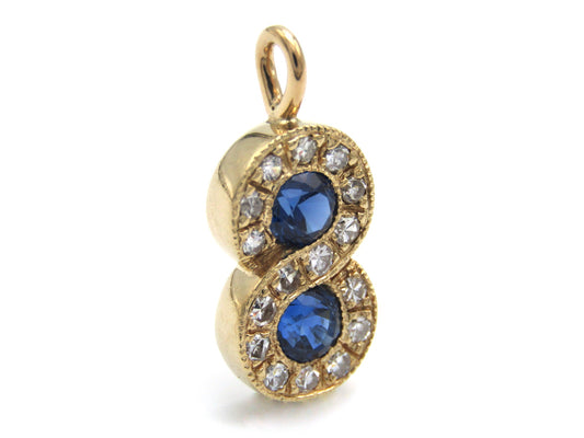 Vintage, 14K gold sapphire and diamond eternity pendant