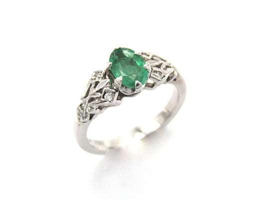 Estate, 18K gold emerald and diamond ring by Jack Friedman