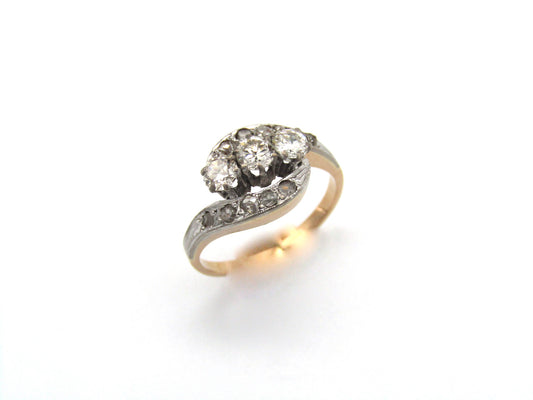 Mid-century, 18K gold trilogy diamond bypass ring