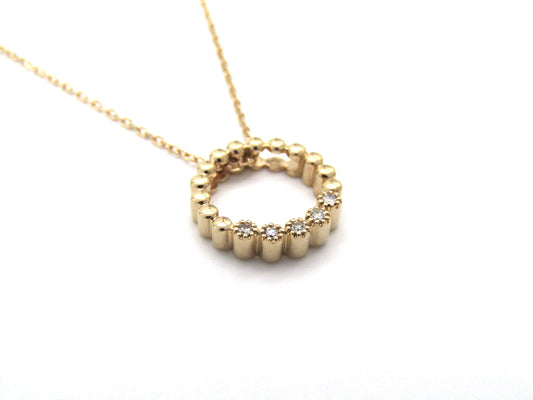 Estate, 9K gold diamond 'circle' pendant