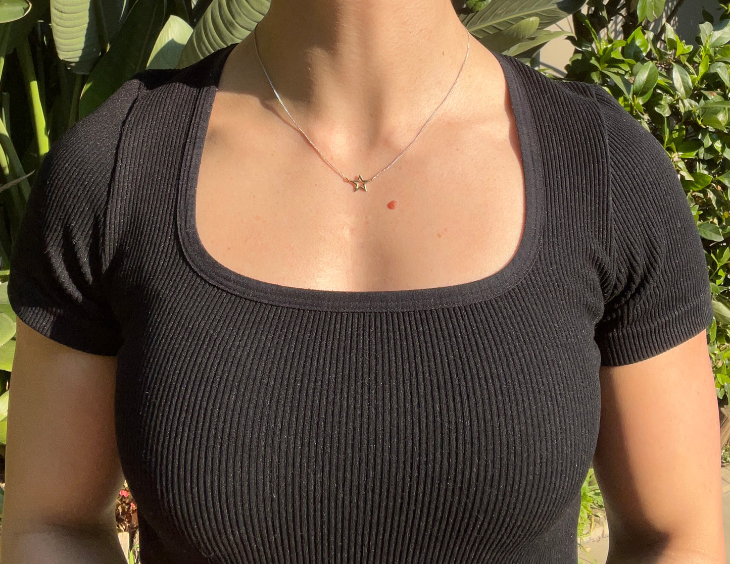 Estate, 9K gold 'star' necklace