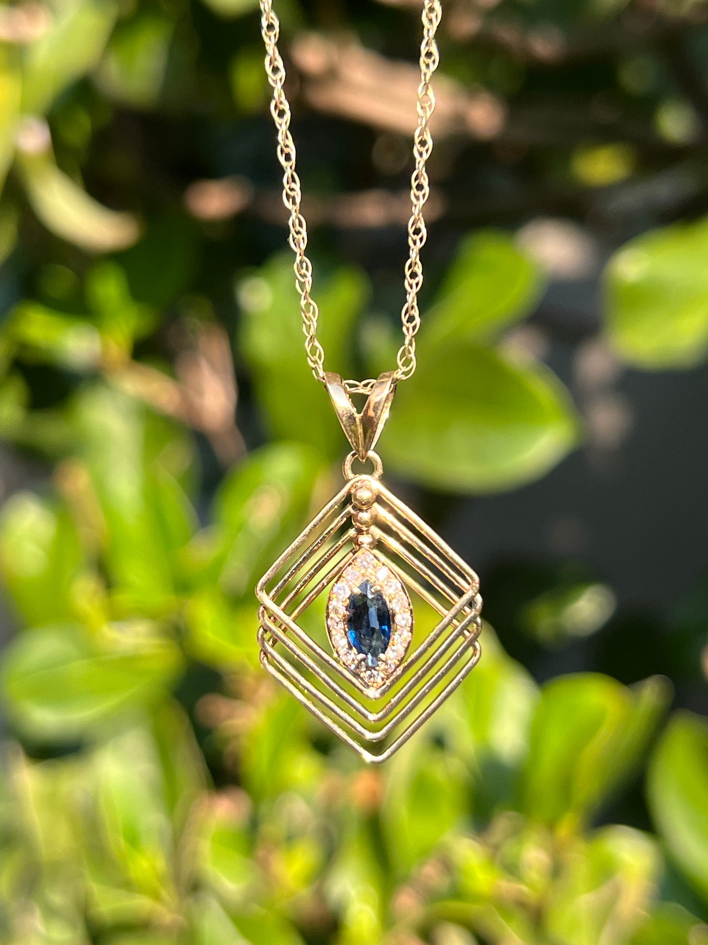 Estate, 18K gold sapphire and diamond pendant