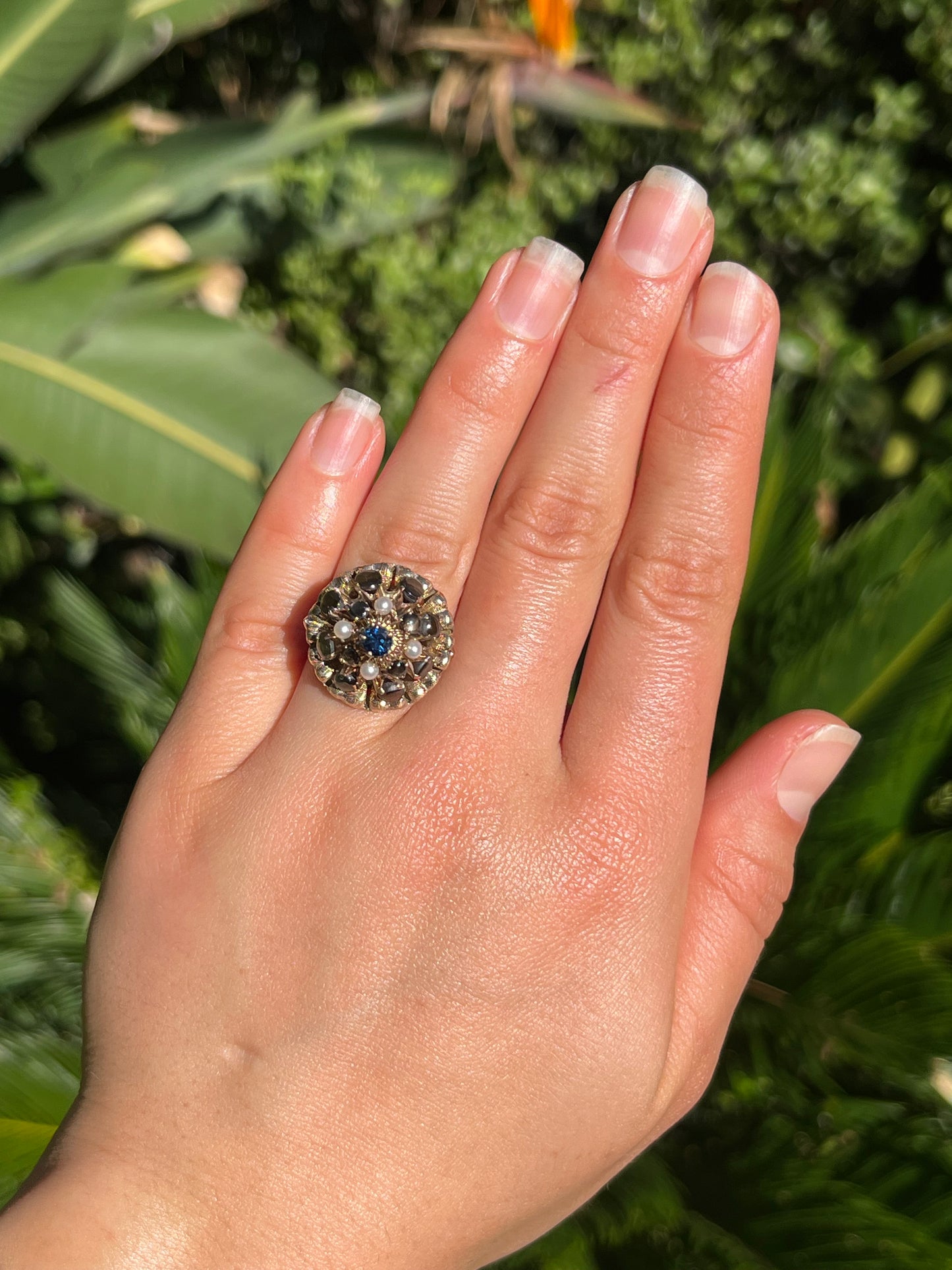 Mid-century, 14K gold blue sapphire, brown star sapphire, and pearl Thai Princess 'spinner' ring