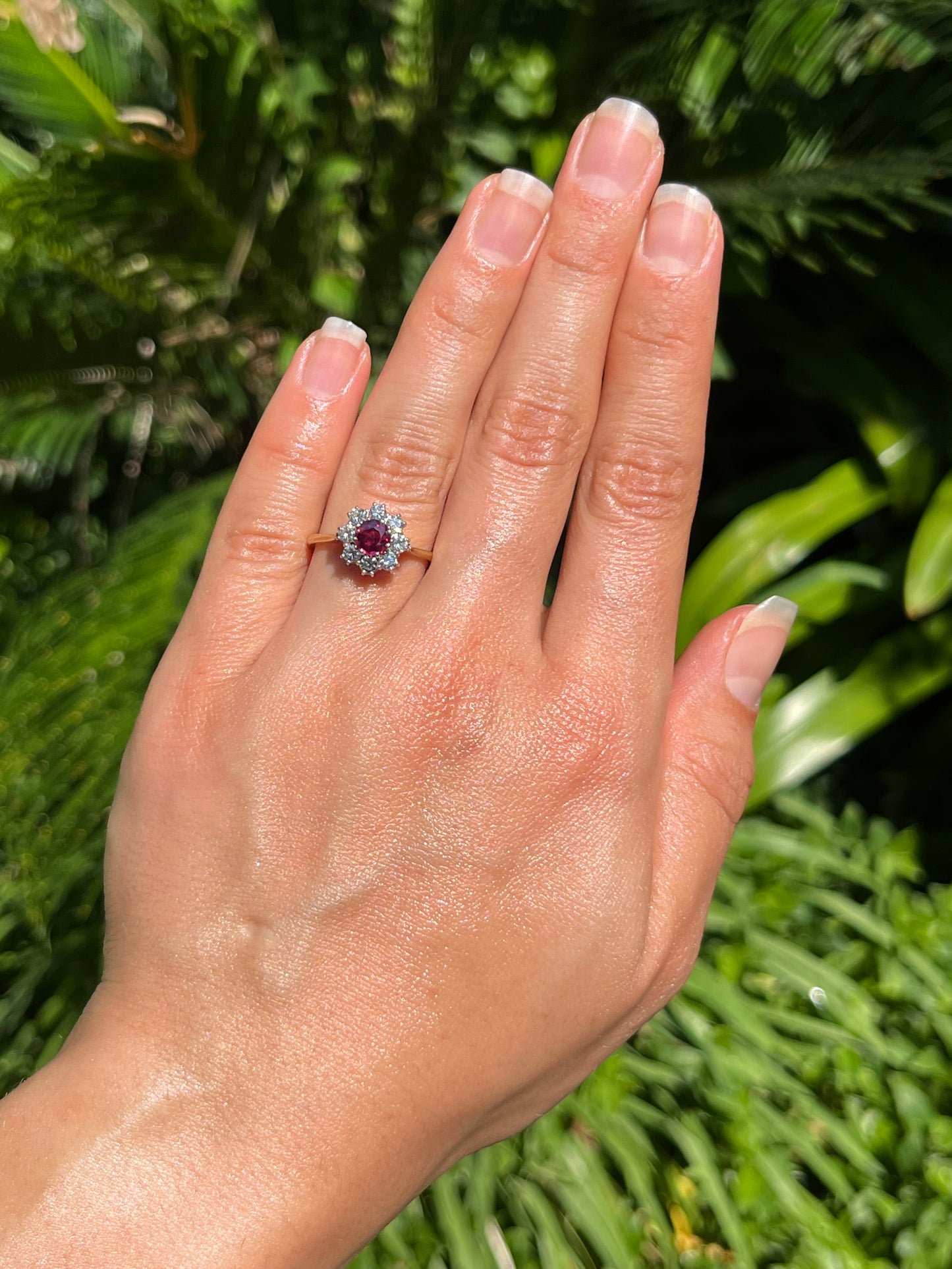 Mid-century, 18K gold ruby and diamond halo ring, Italy