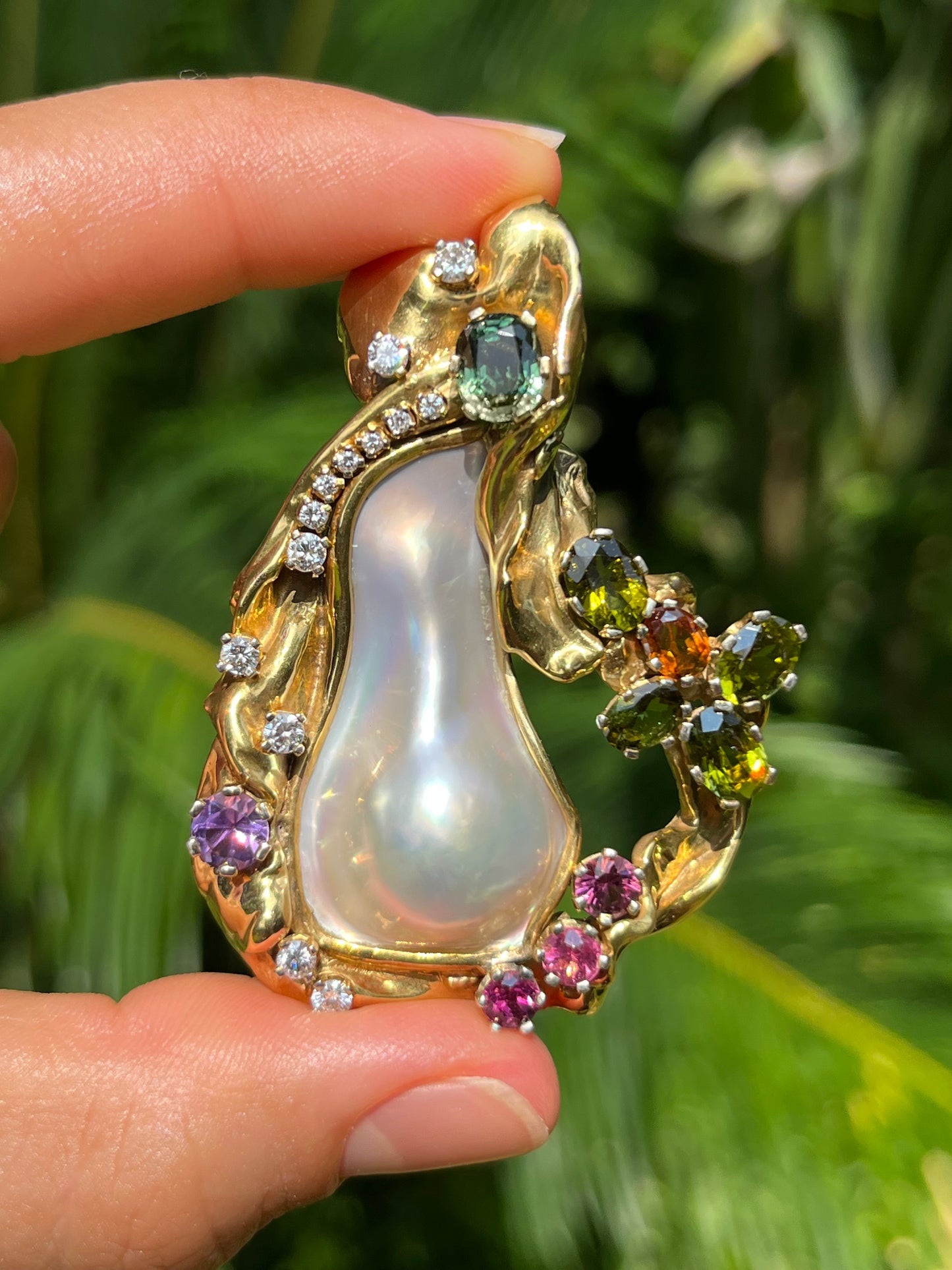 Vintage, designer 9K gold  mabé pearl, sapphire, tourmaline, citrine, amethyst, and diamond necklace enhancer.
