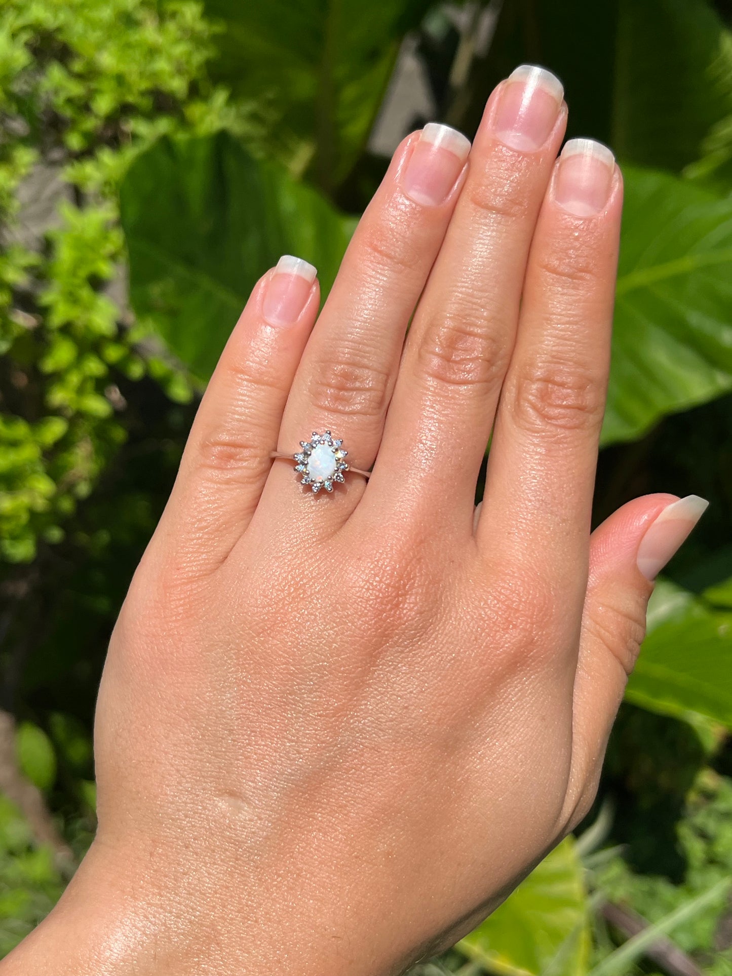 Estate, 14K gold opal and diamond halo ring