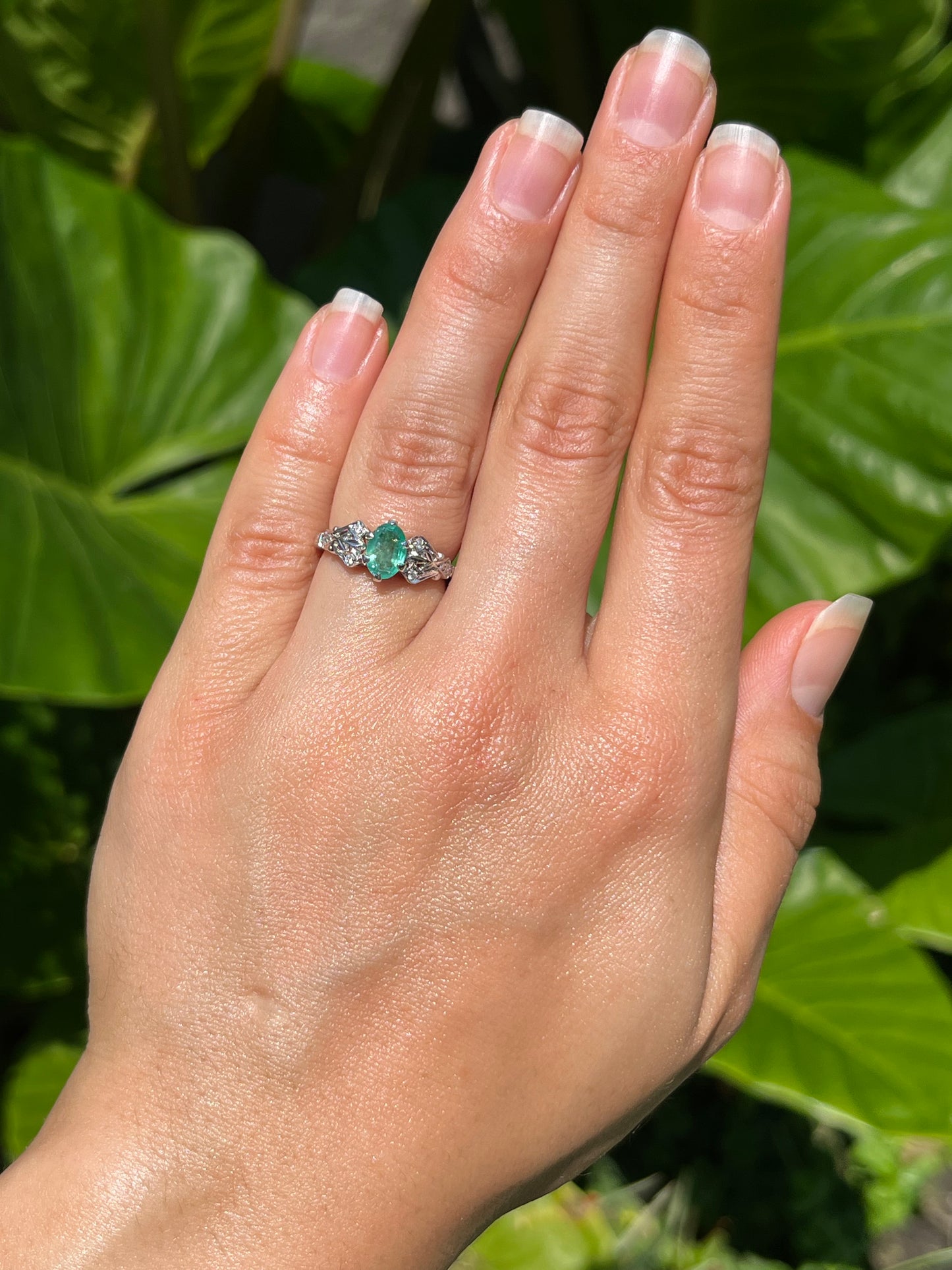 Estate, 18K gold emerald and diamond ring by Jack Friedman