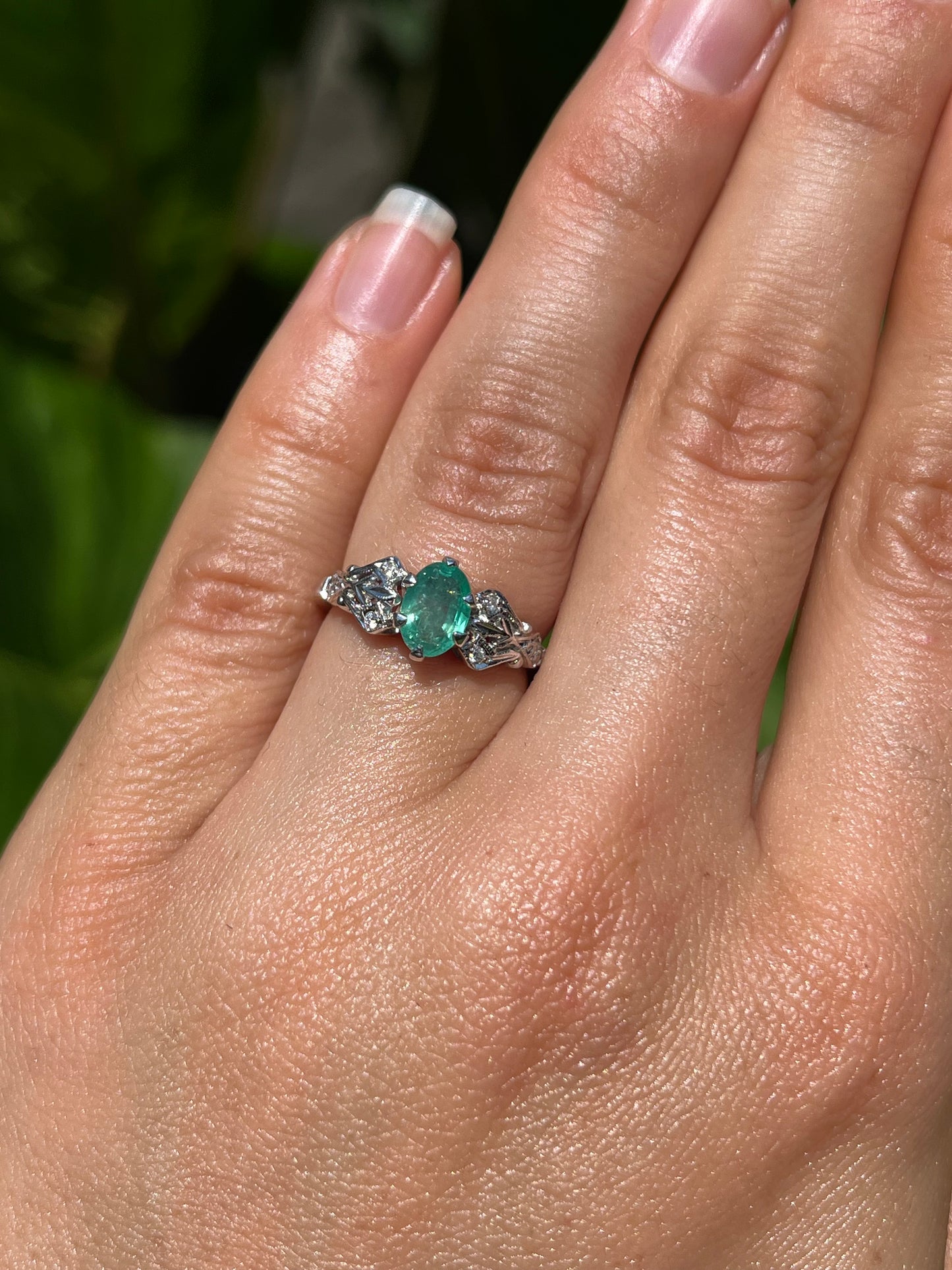 Estate, 18K gold emerald and diamond ring by Jack Friedman