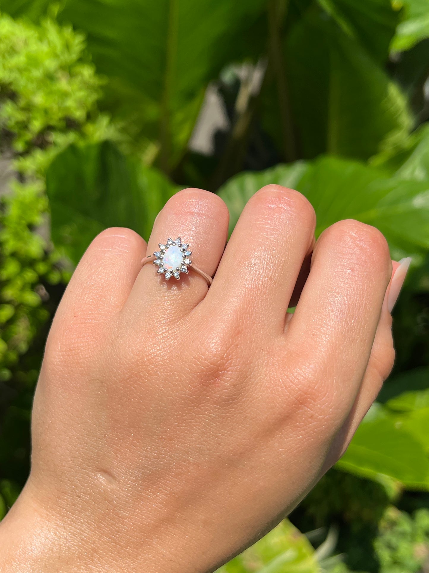 Estate, 14K gold opal and diamond halo ring