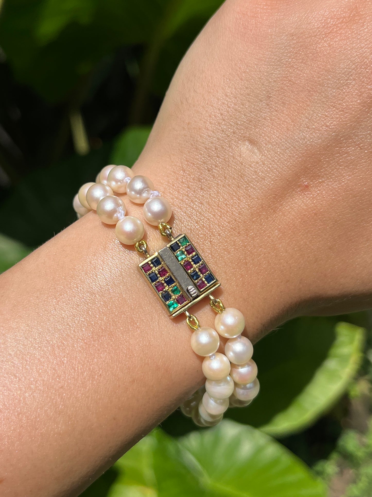 Mid-century, 18K gold double-strand cultured pearl, ruby, sapphire and emerald bracelet