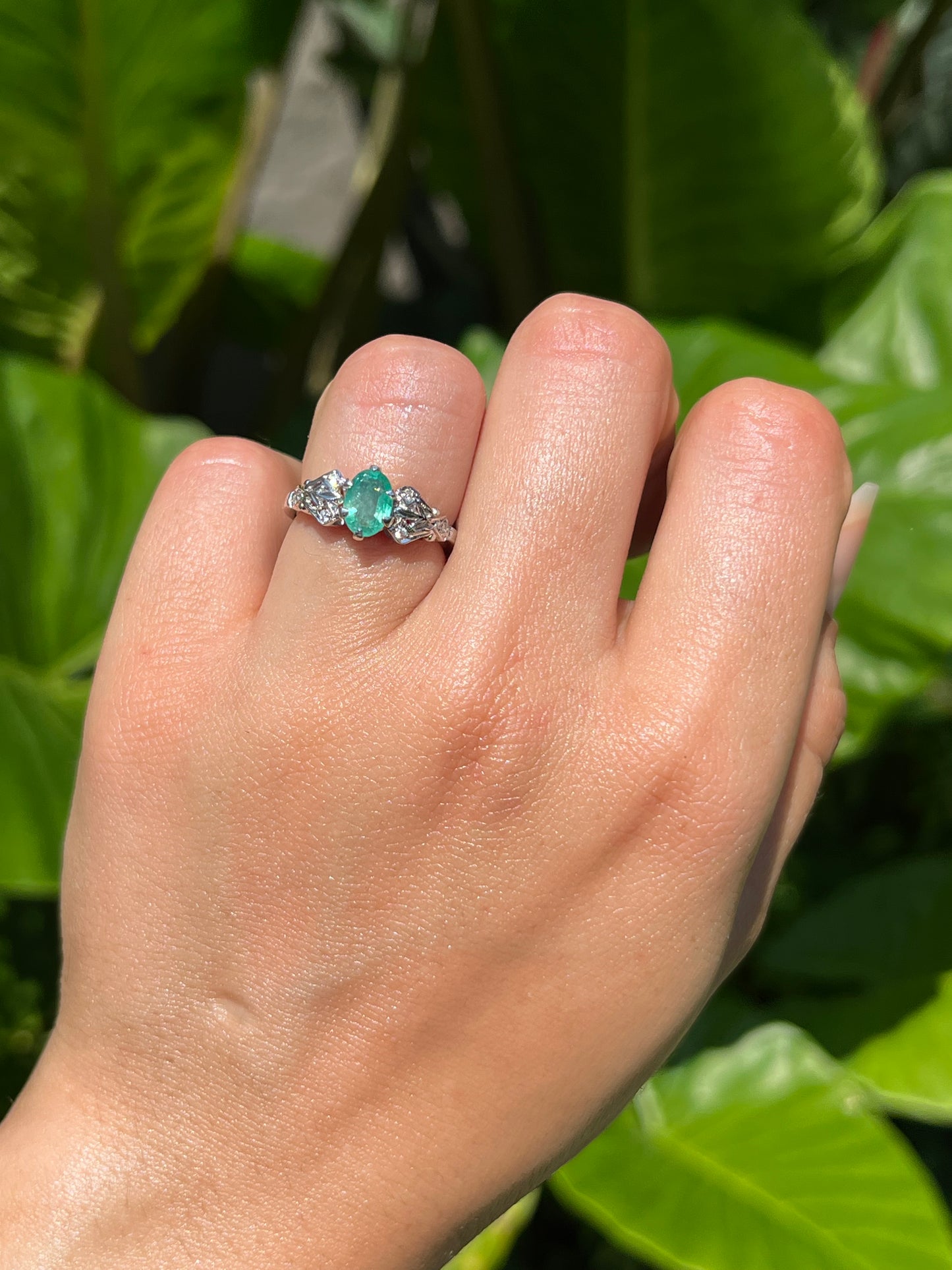 Estate, 18K gold emerald and diamond ring by Jack Friedman