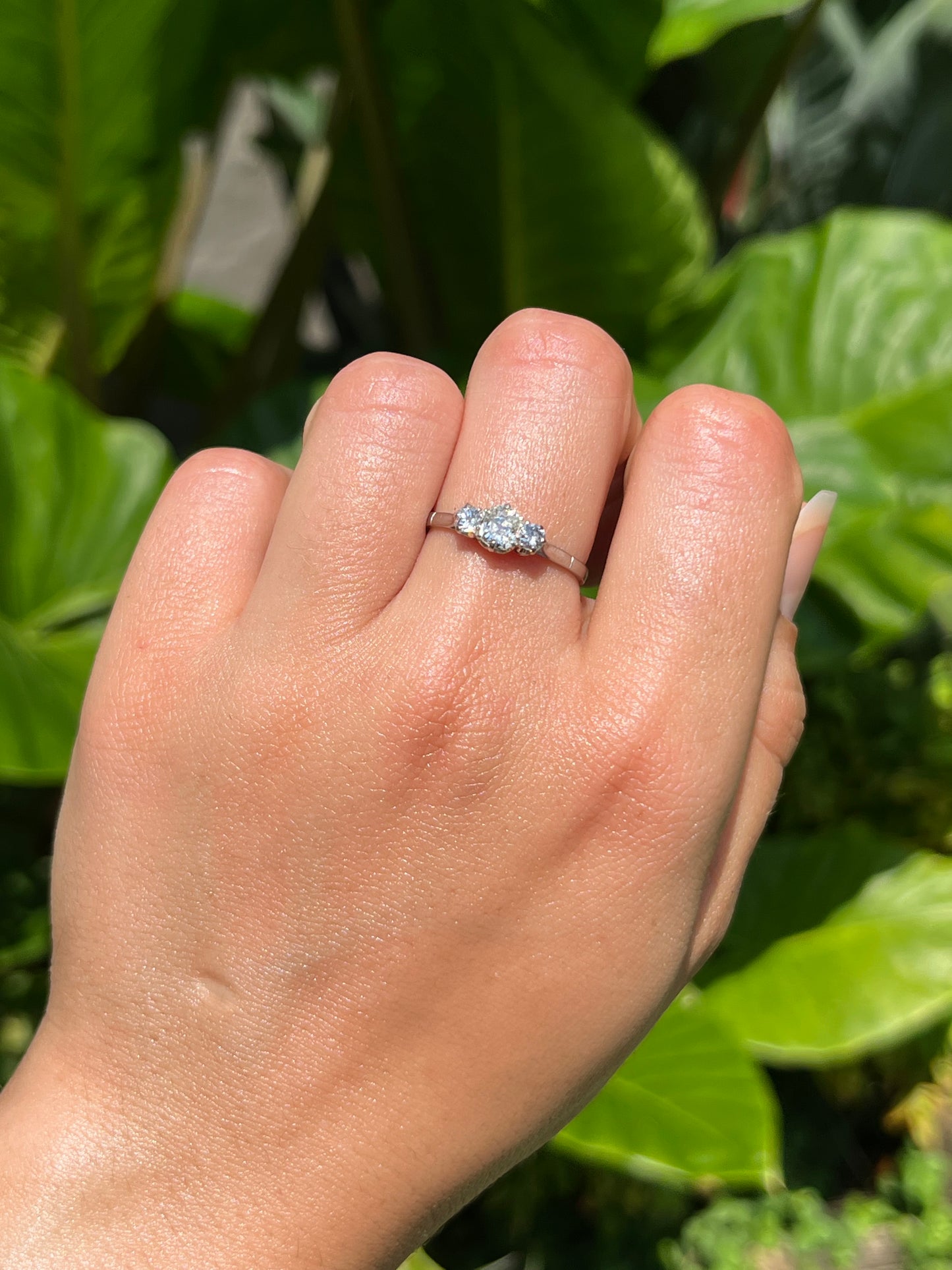 Art Deco, platinum and diamond three-stone engagement ring by William Wilkinson Ltd