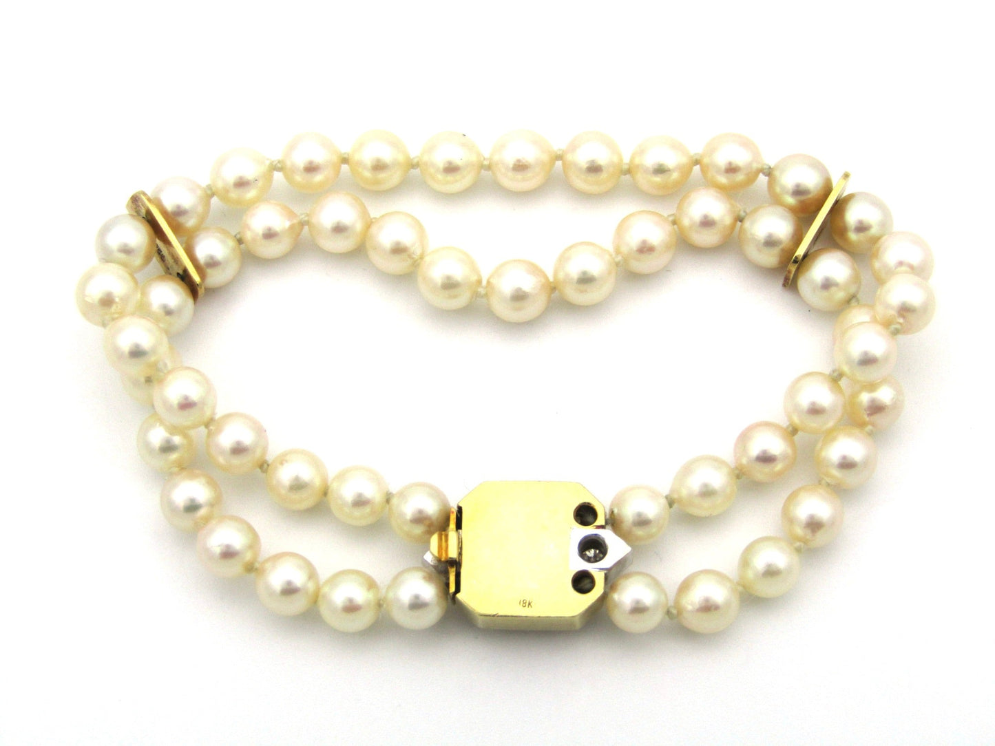 Vintage, 18K gold double-strand cultured pearl, sapphire and diamond bracelet