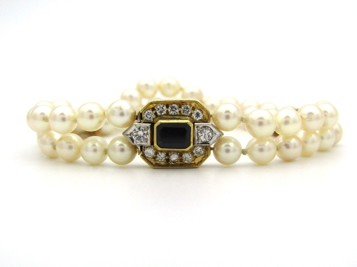 Vintage, 18K gold double-strand cultured pearl, sapphire and diamond bracelet