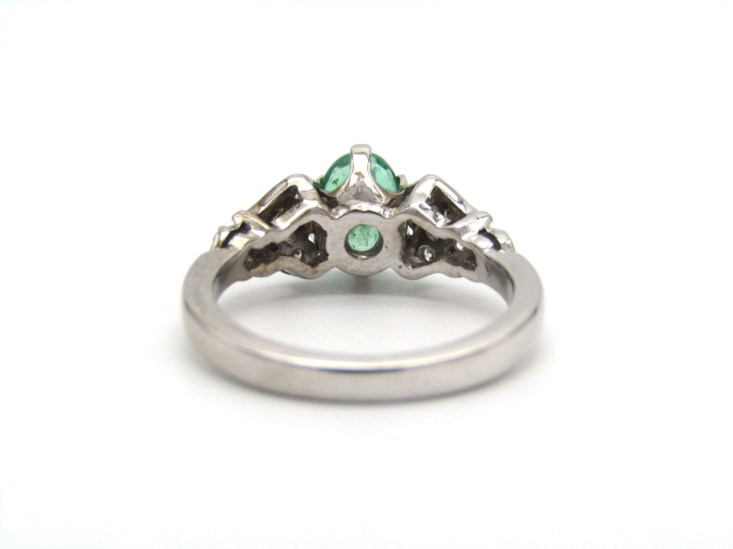Estate, 18K gold emerald and diamond ring by Jack Friedman