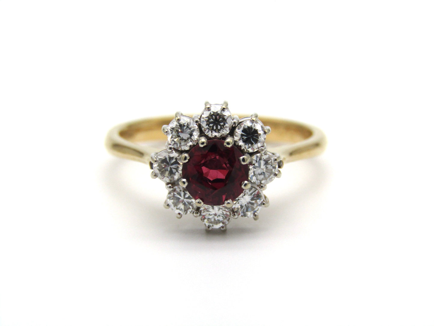 Mid-century, 18K gold ruby and diamond halo ring, Italy