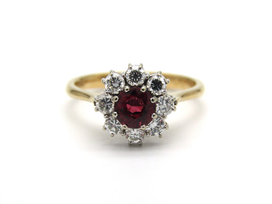 Mid-century, 18K gold ruby and diamond halo ring, Italy