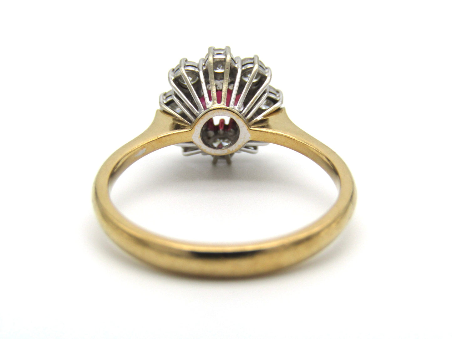 Mid-century, 18K gold ruby and diamond halo ring, Italy
