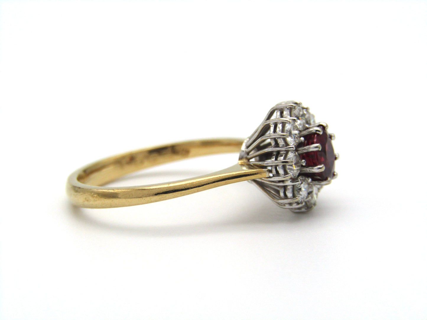 Mid-century, 18K gold ruby and diamond halo ring, Italy