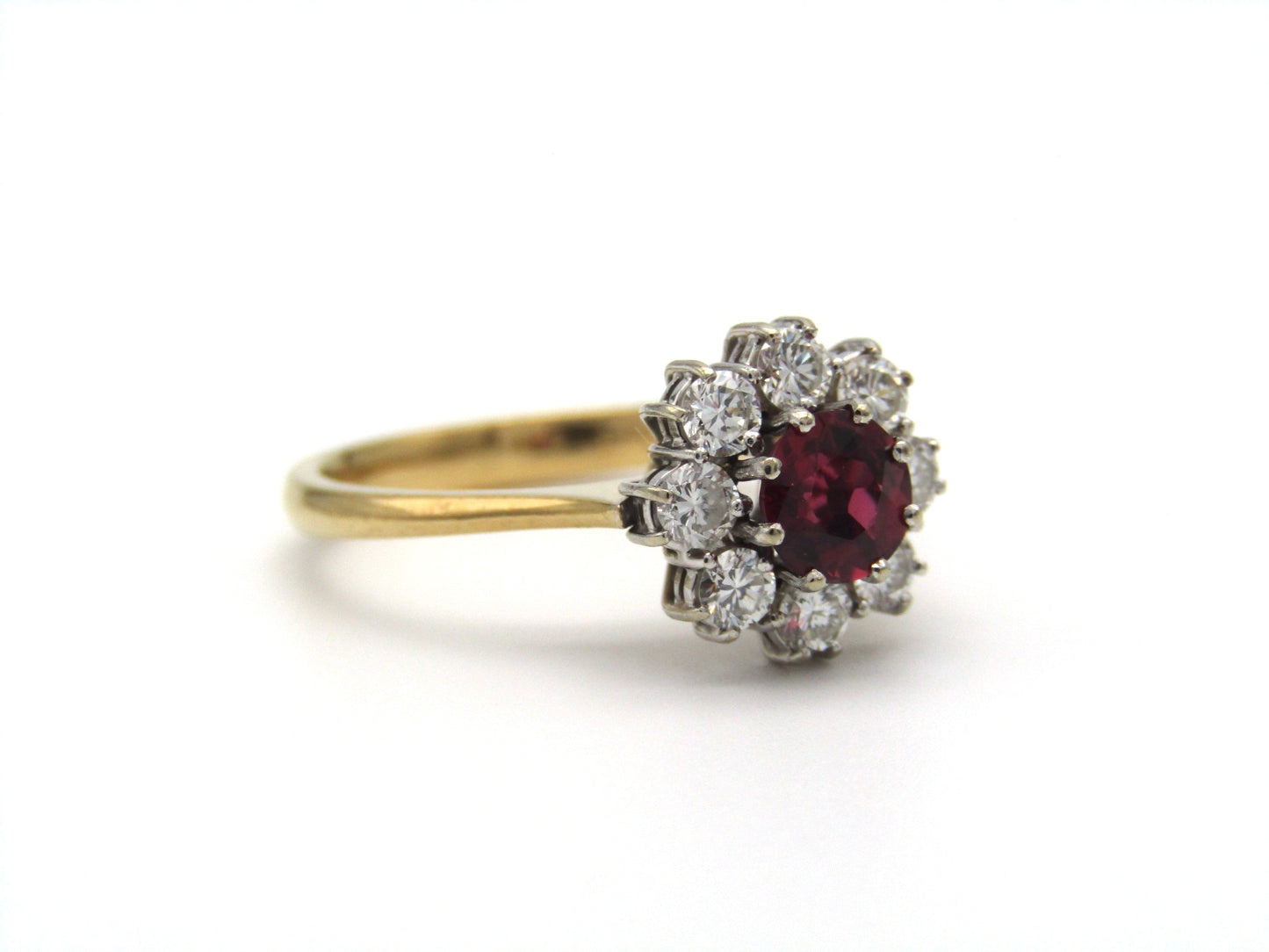 Mid-century, 18K gold ruby and diamond halo ring, Italy