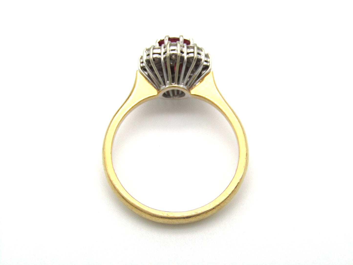 Mid-century, 18K gold ruby and diamond halo ring, Italy