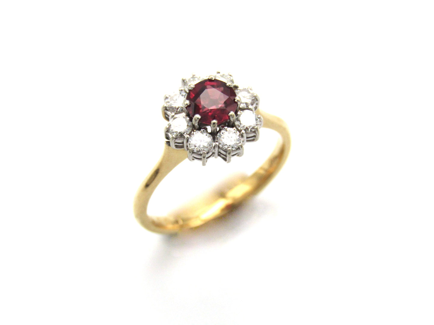 Mid-century, 18K gold ruby and diamond halo ring, Italy