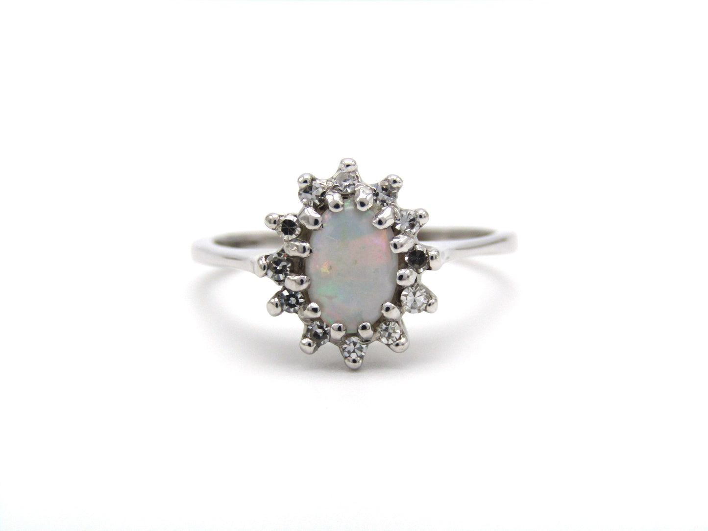 Estate, 14K gold opal and diamond halo ring