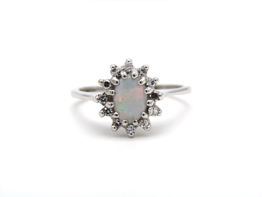 Estate, 14K gold opal and diamond halo ring
