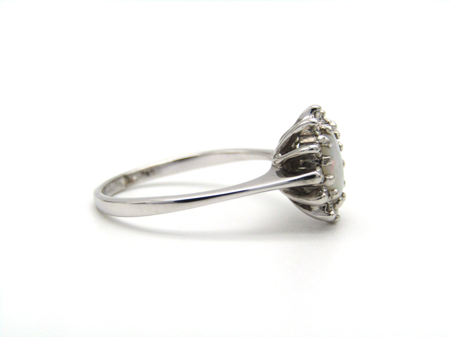 Estate, 14K gold opal and diamond halo ring