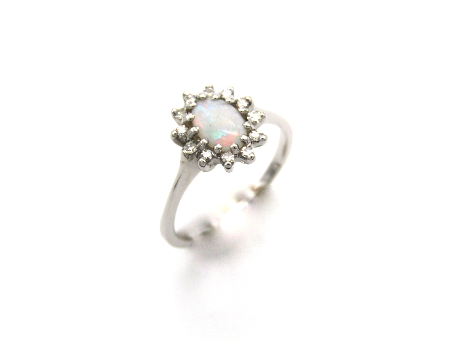 Estate, 14K gold opal and diamond halo ring