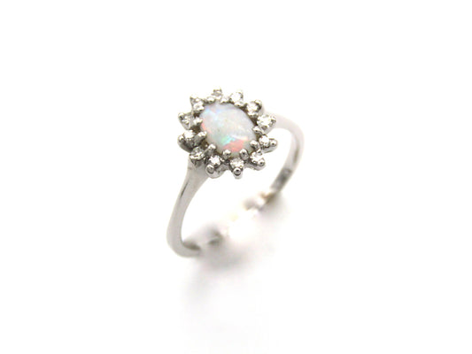Estate, 14K gold opal and diamond halo ring