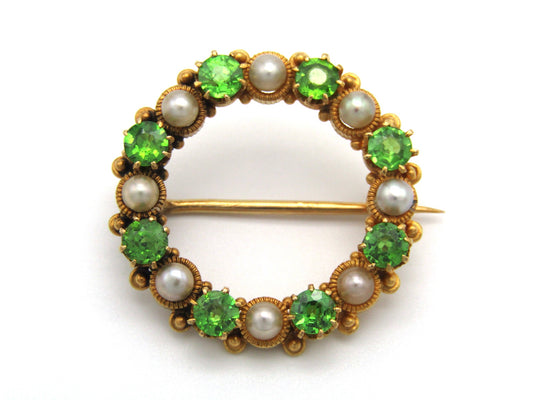 Edwardian, 18K gold demantoid garnet and pearl circle brooch