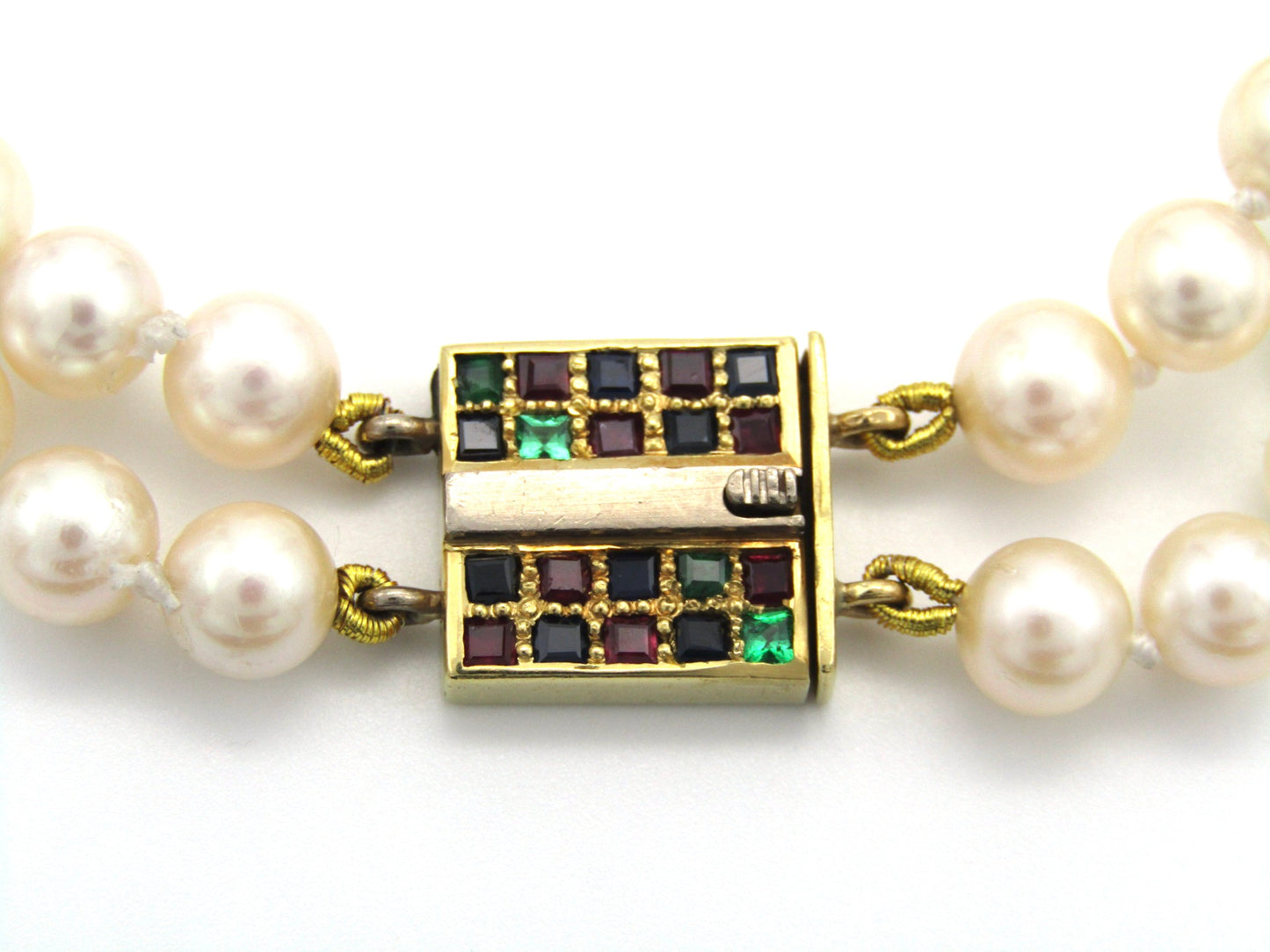 Mid-century, 18K gold double-strand cultured pearl, ruby, sapphire and emerald bracelet