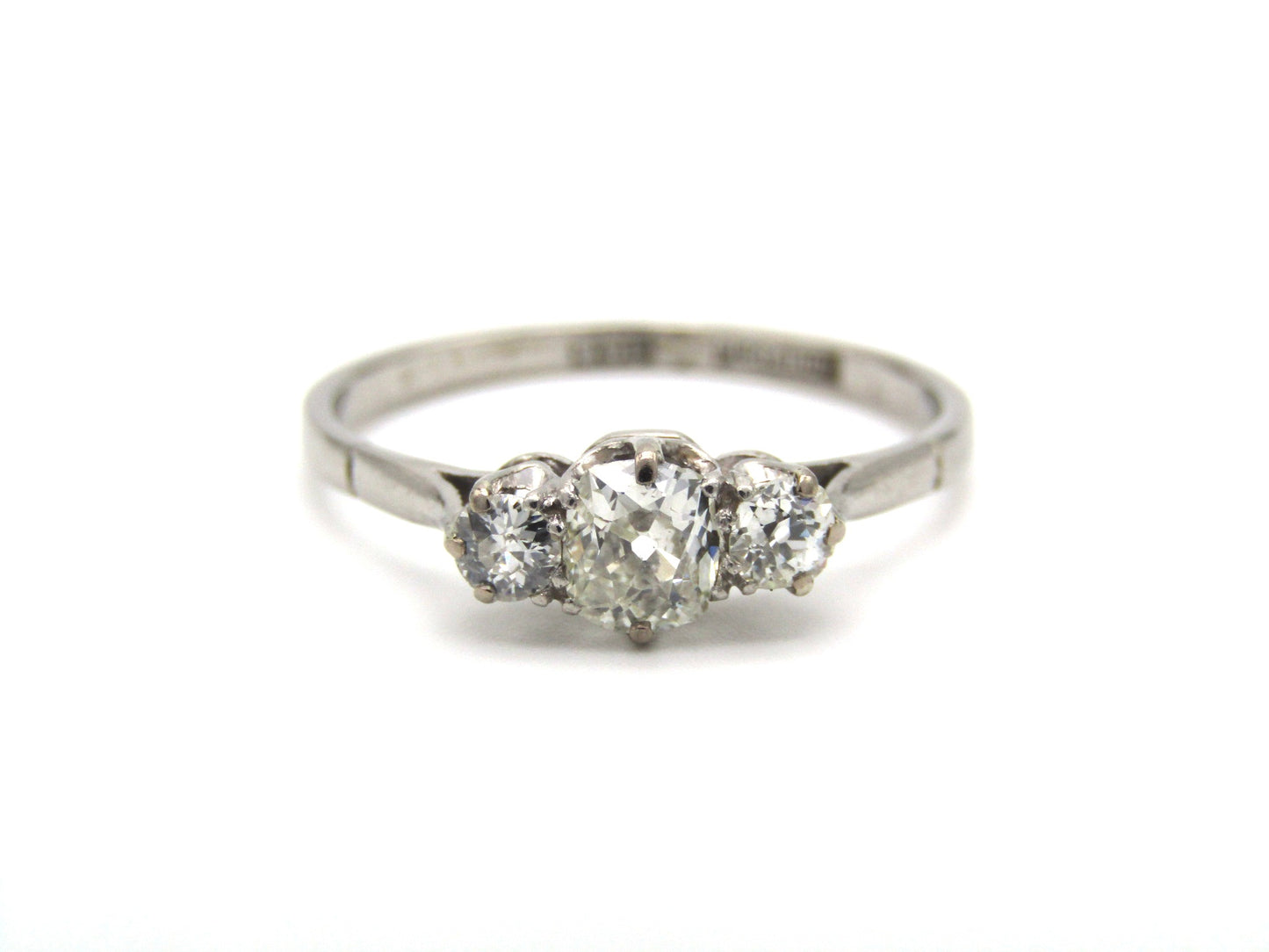 Art Deco, platinum and diamond three-stone engagement ring by William Wilkinson Ltd