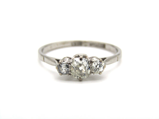 Art Deco, platinum and diamond three-stone engagement ring by William Wilkinson Ltd