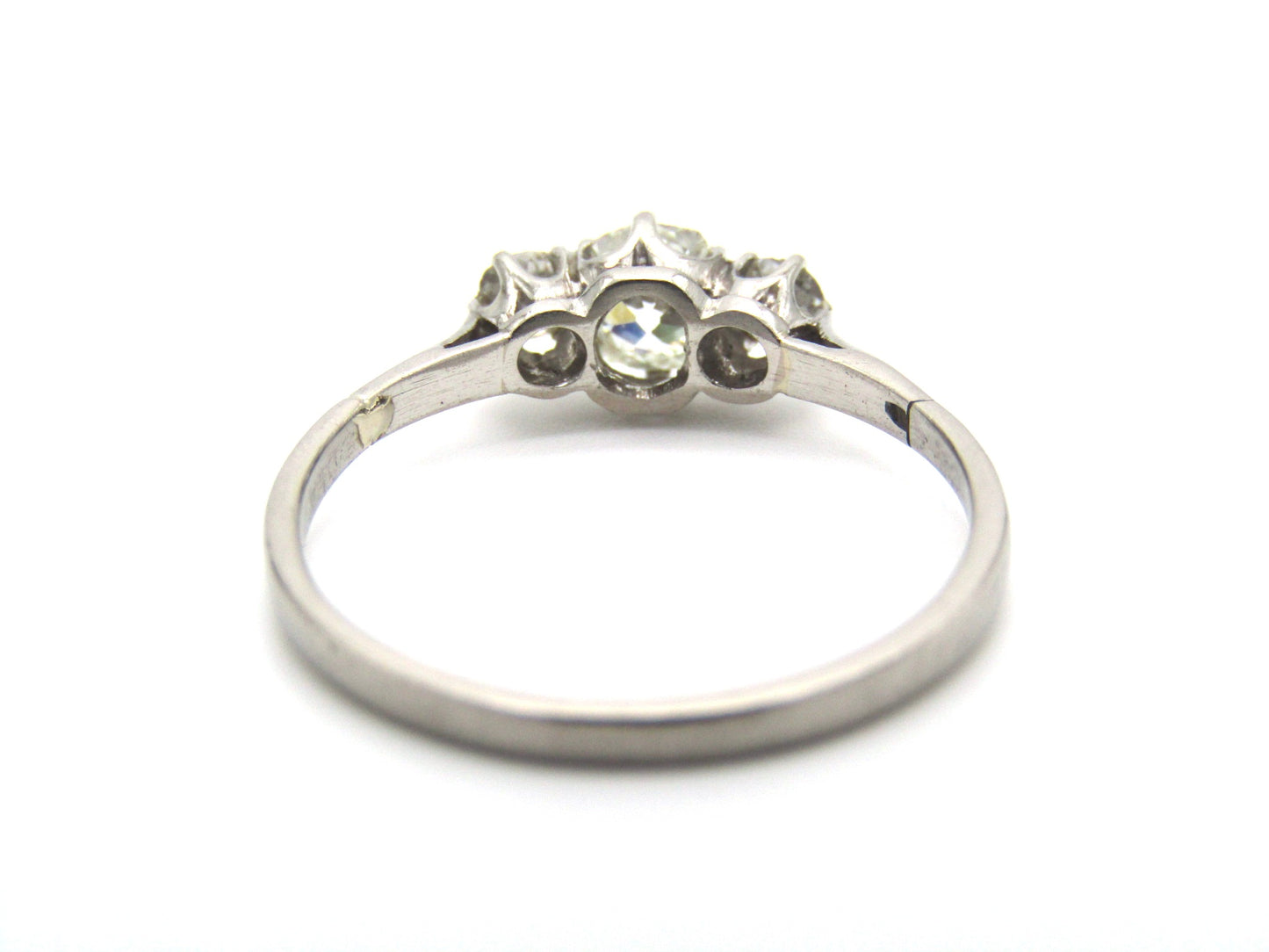 Art Deco, platinum and diamond three-stone engagement ring by William Wilkinson Ltd