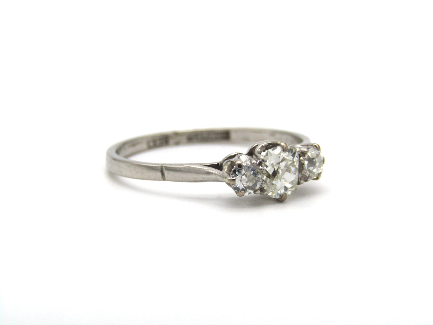 Art Deco, platinum and diamond three-stone engagement ring by William Wilkinson Ltd