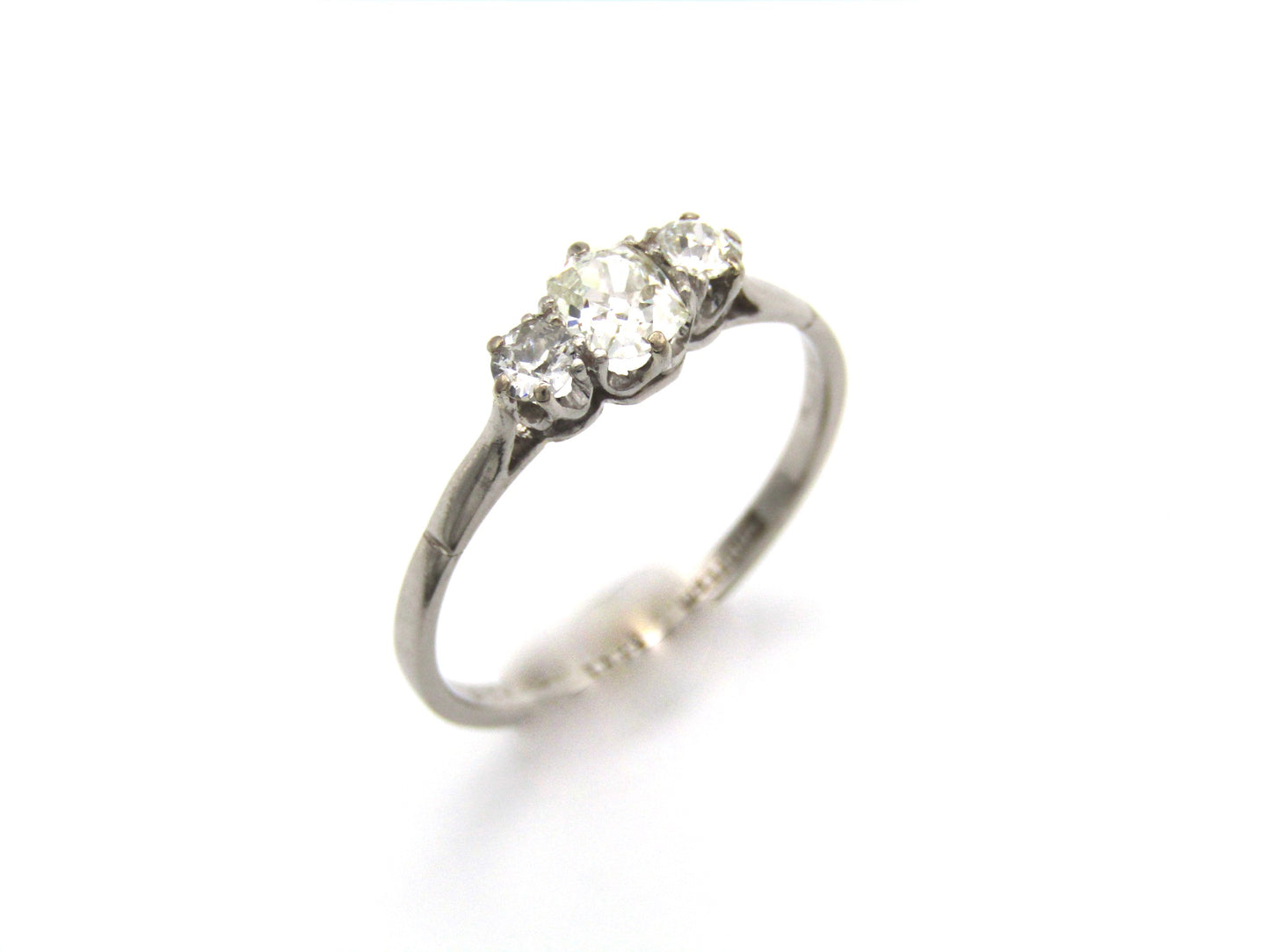 Art Deco, platinum and diamond three-stone engagement ring by William Wilkinson Ltd