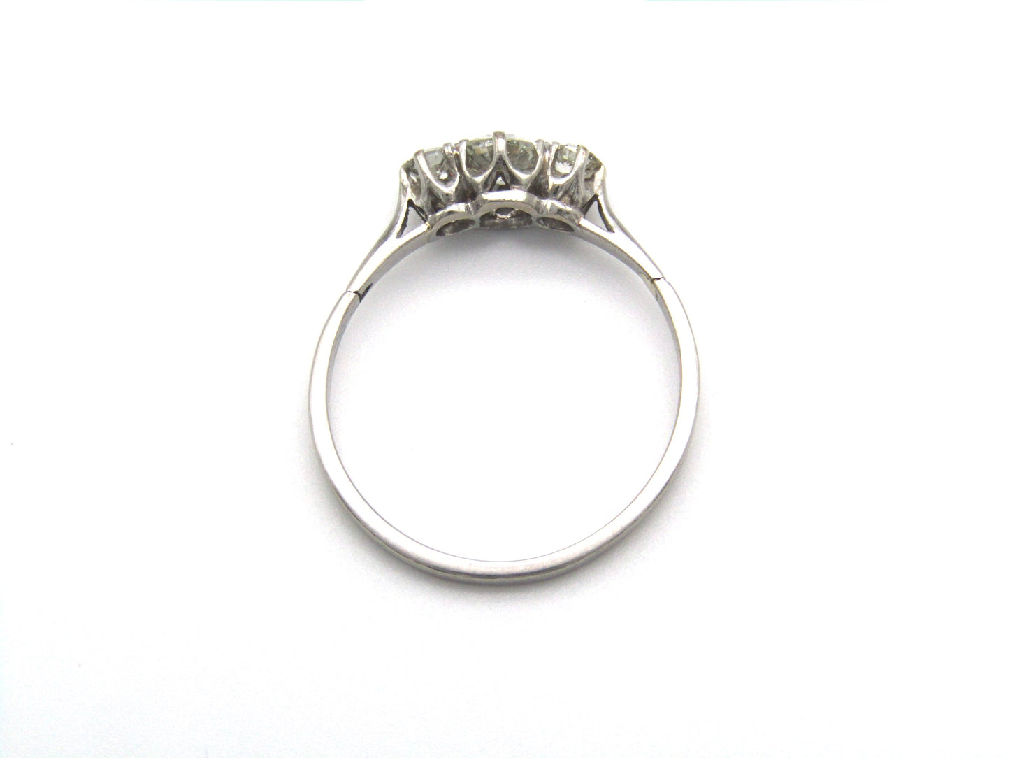 Art Deco, platinum and diamond three-stone engagement ring by William Wilkinson Ltd