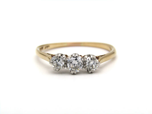 Mid-century 18K gold and platinum three-stone diamond ring