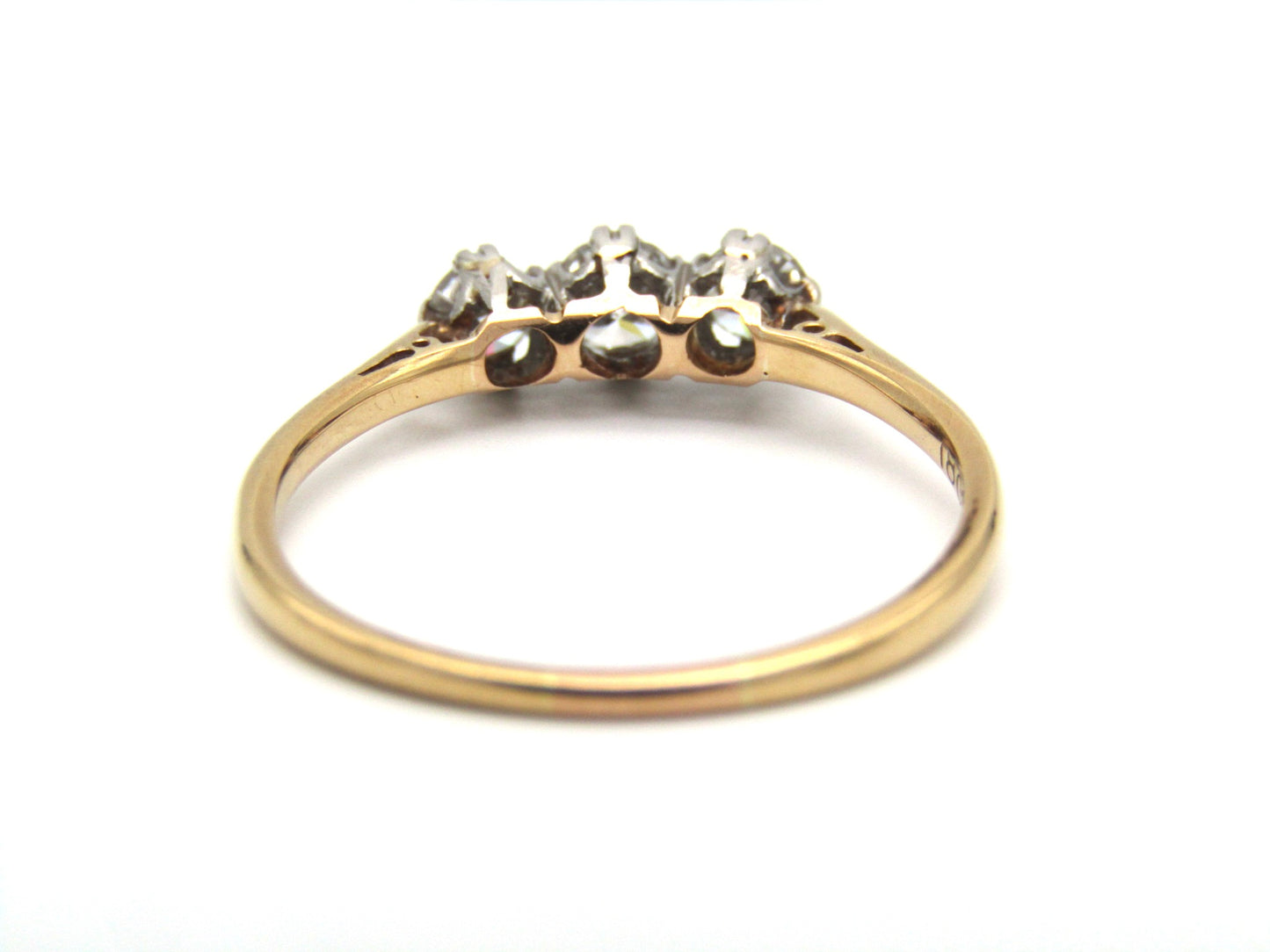 Mid-century 18K gold and platinum three-stone diamond ring