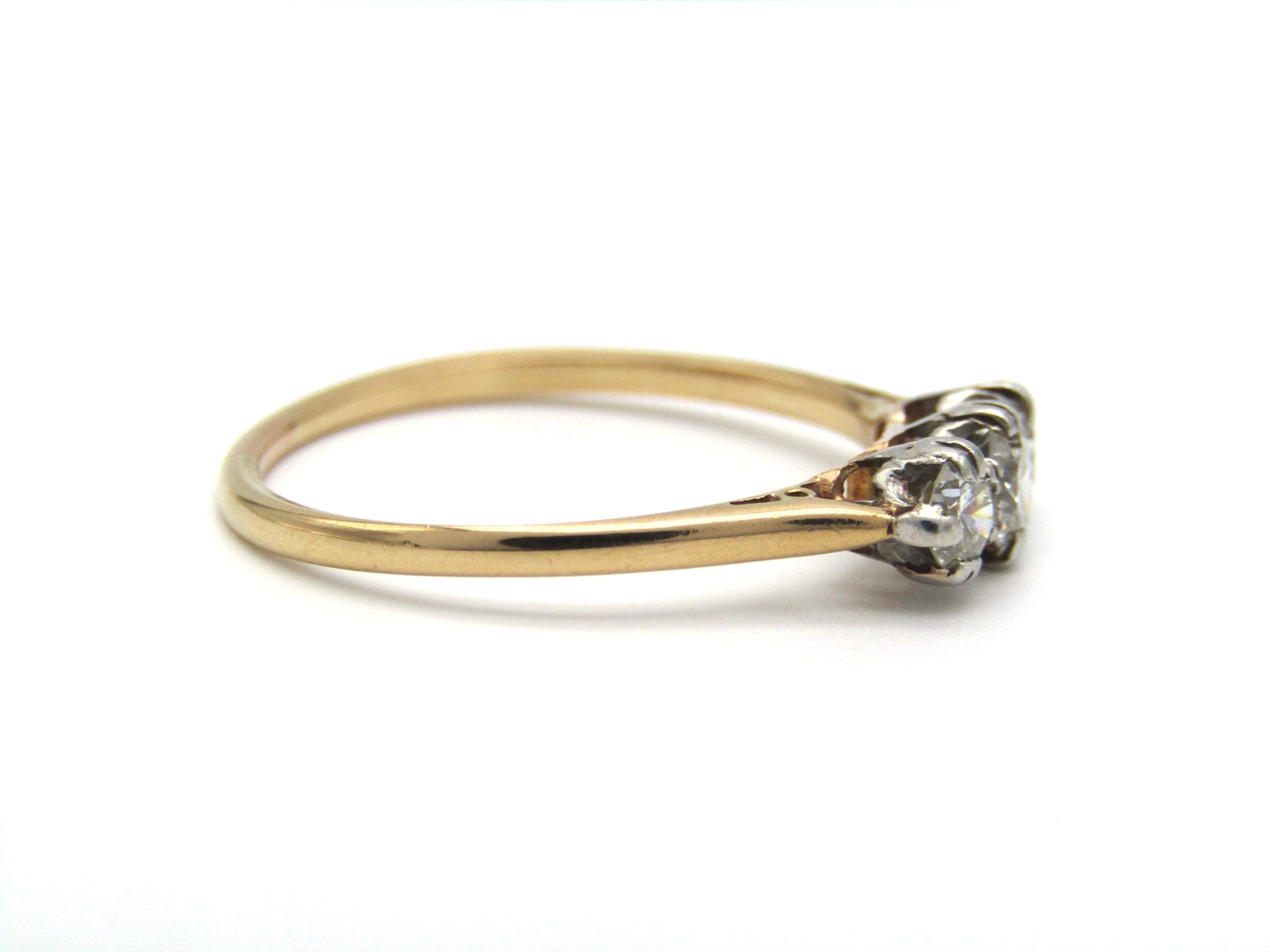 Mid-century 18K gold and platinum three-stone diamond ring