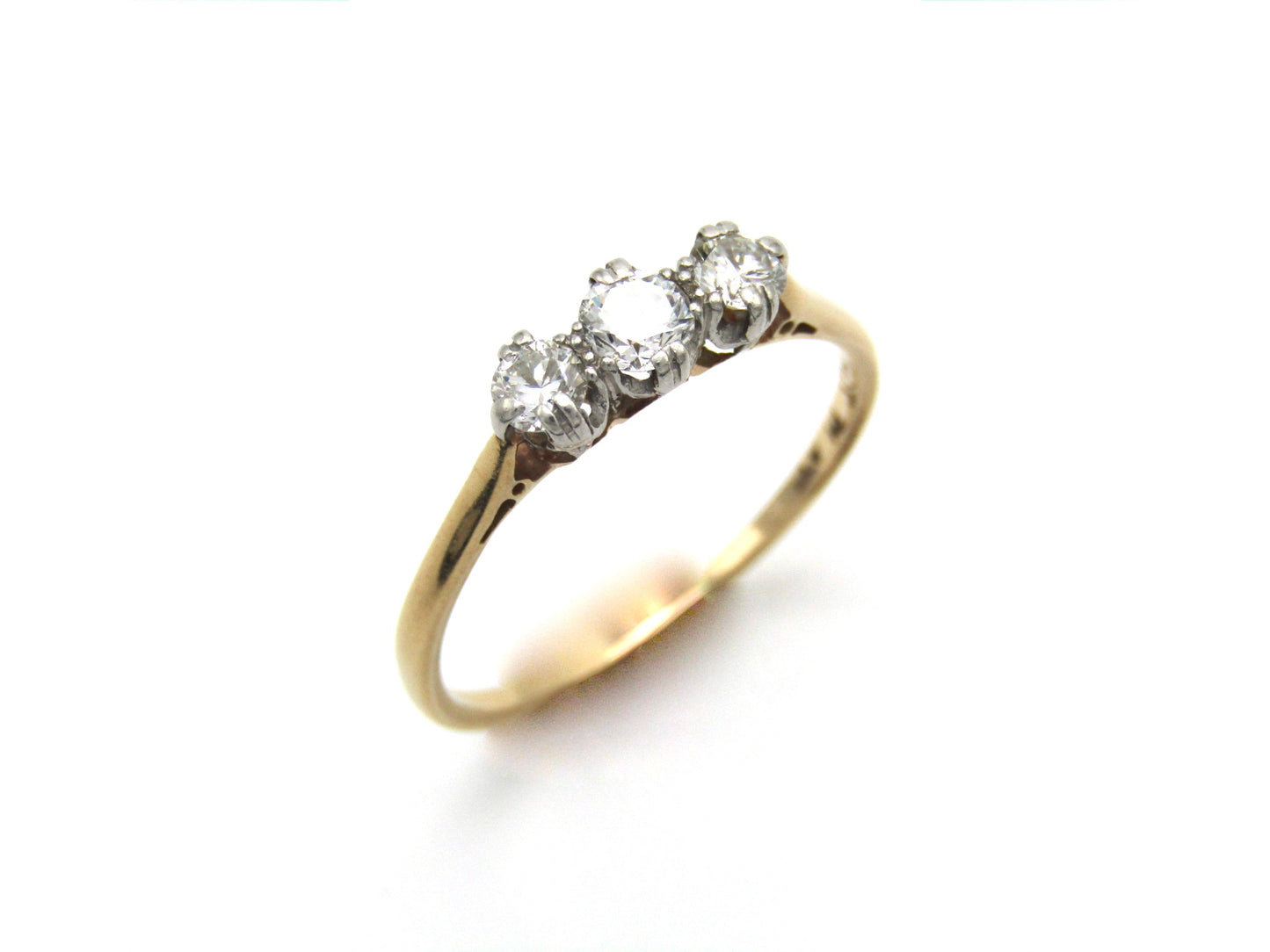 Mid-century 18K gold and platinum three-stone diamond ring