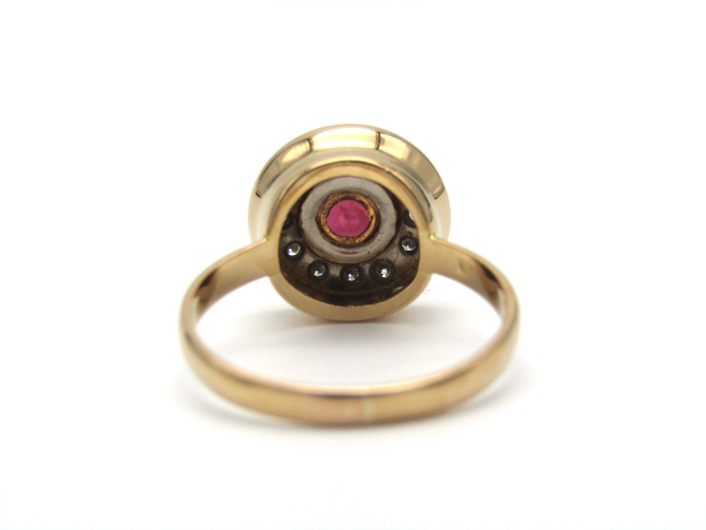 Vintage, 18K gold ruby and diamond halo ring