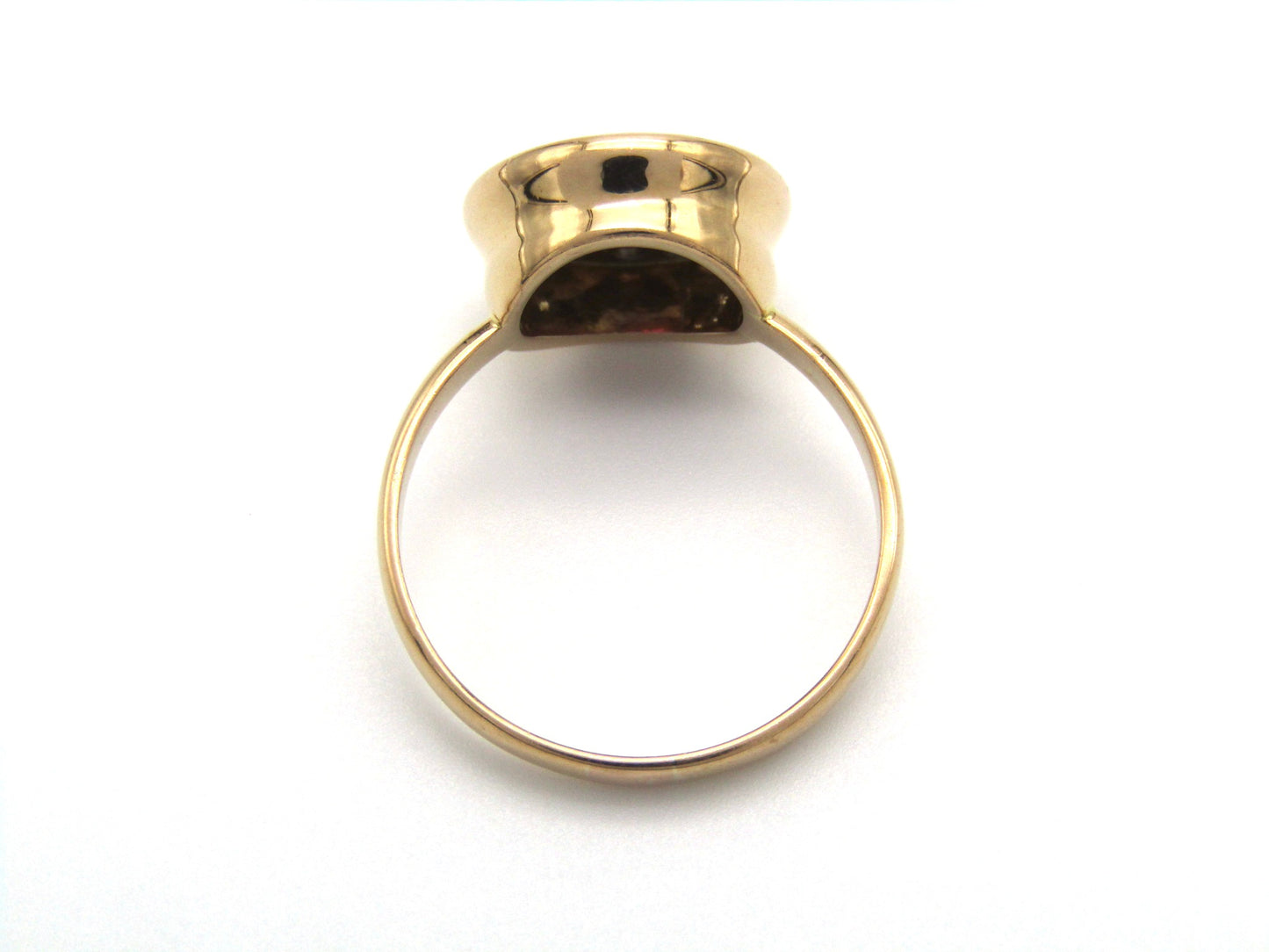 Vintage, 18K gold ruby and diamond halo ring