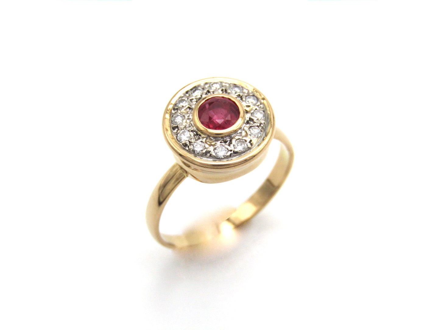 Vintage, 18K gold ruby and diamond halo ring