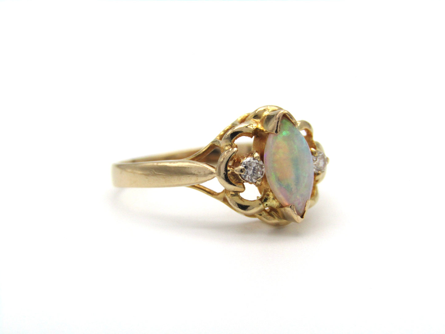 Mid-century, 18K gold opal and diamond ring